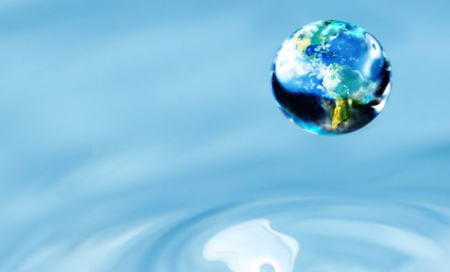 graphic of the earth floating in front of a blue background